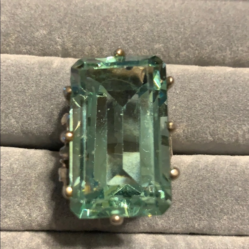 Silver ring with large greenish jewel size 8